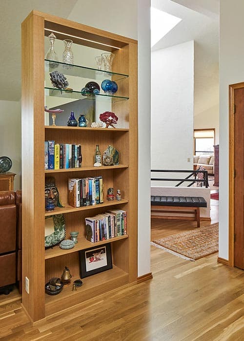 Built-in bookcase in bright airy kitchen in Portland, Oregon