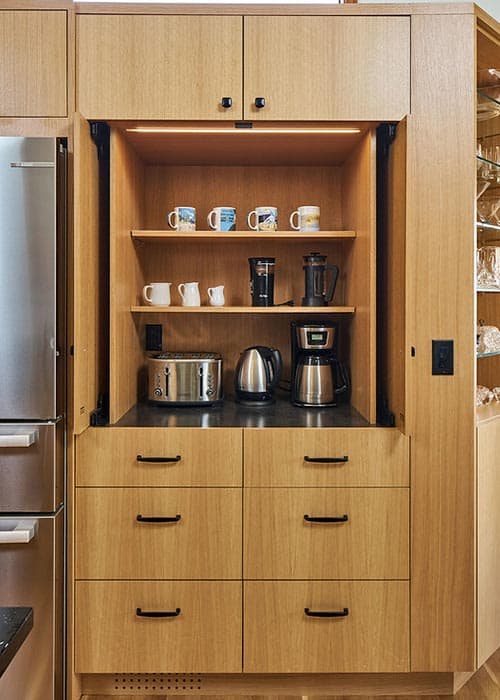 Built-in breakfast nook with storage and under cabinet lighting