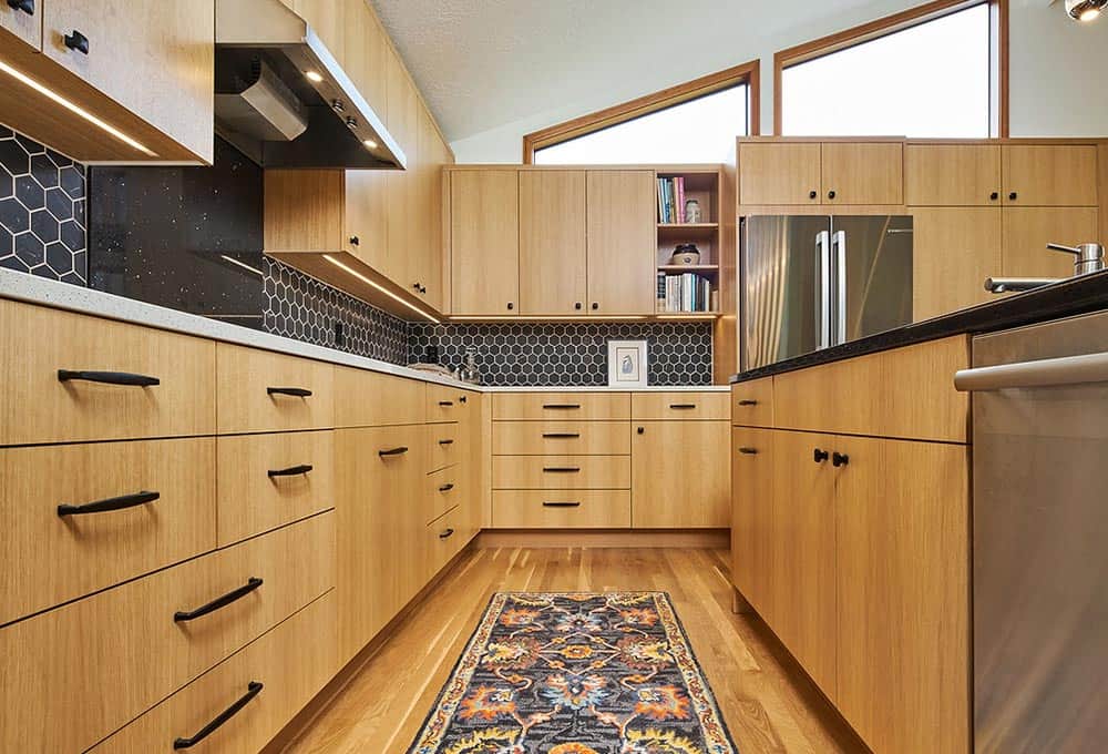 Custom kitchen with wood cabinetry storage and built in shelves