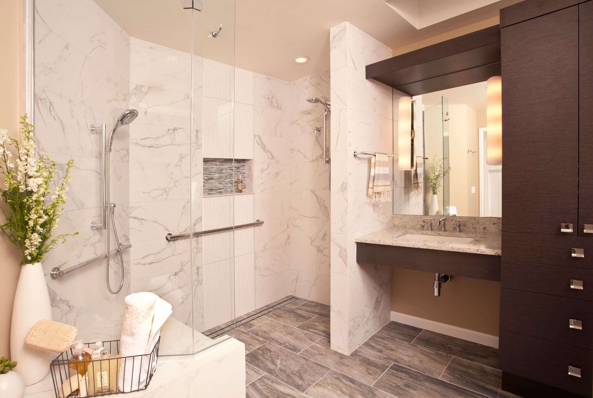 Accessible bathroom with marble shower and storage