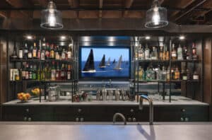 basement bar with shelving and countertop