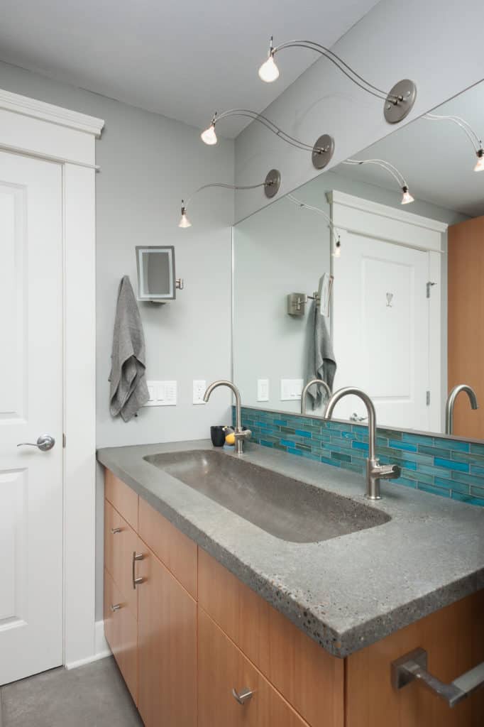 Thoughtful lighting design makes this bath comfy and healthy.