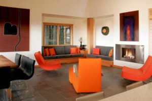 Flame orange chairs in a living room.