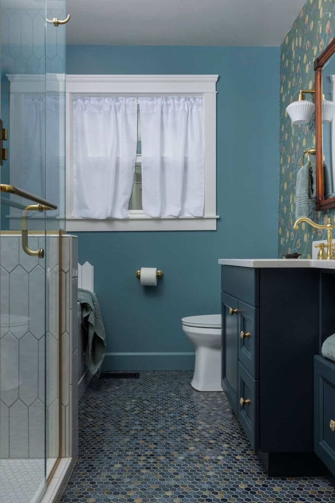 teal bathroom with floral wallpaper