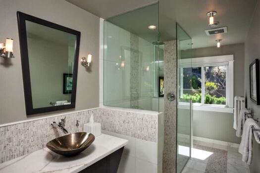 Large bathroom with standing glass shower and window