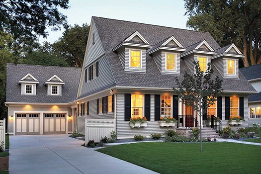 Alt tag: Two story home with 14 windows and two car garage