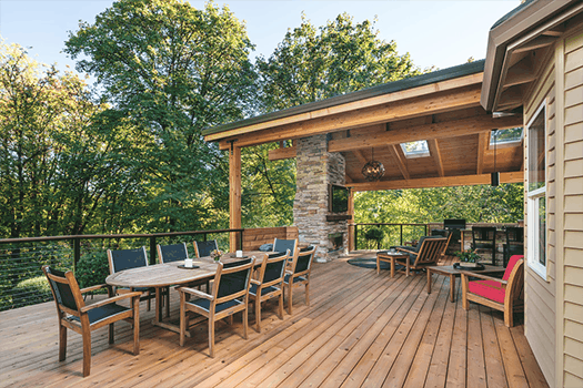 Expansive partially covered deck with dining and living space