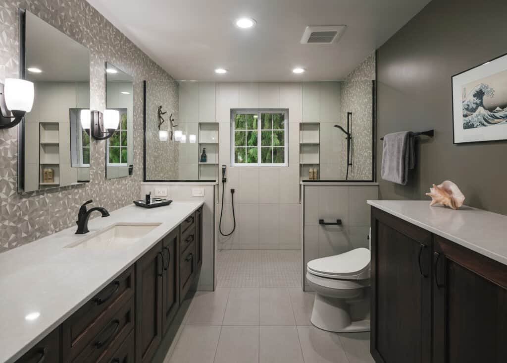 Warm earth toned bathroom with walk-in shower and rich accents.