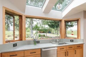 kitchen design with big windows and skylights