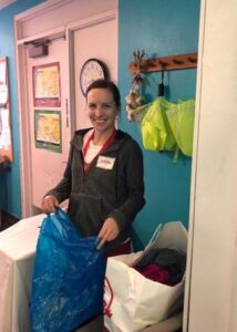 Neil Kelly employee sorting donations at St. Johns Center for Opportunity in Portland