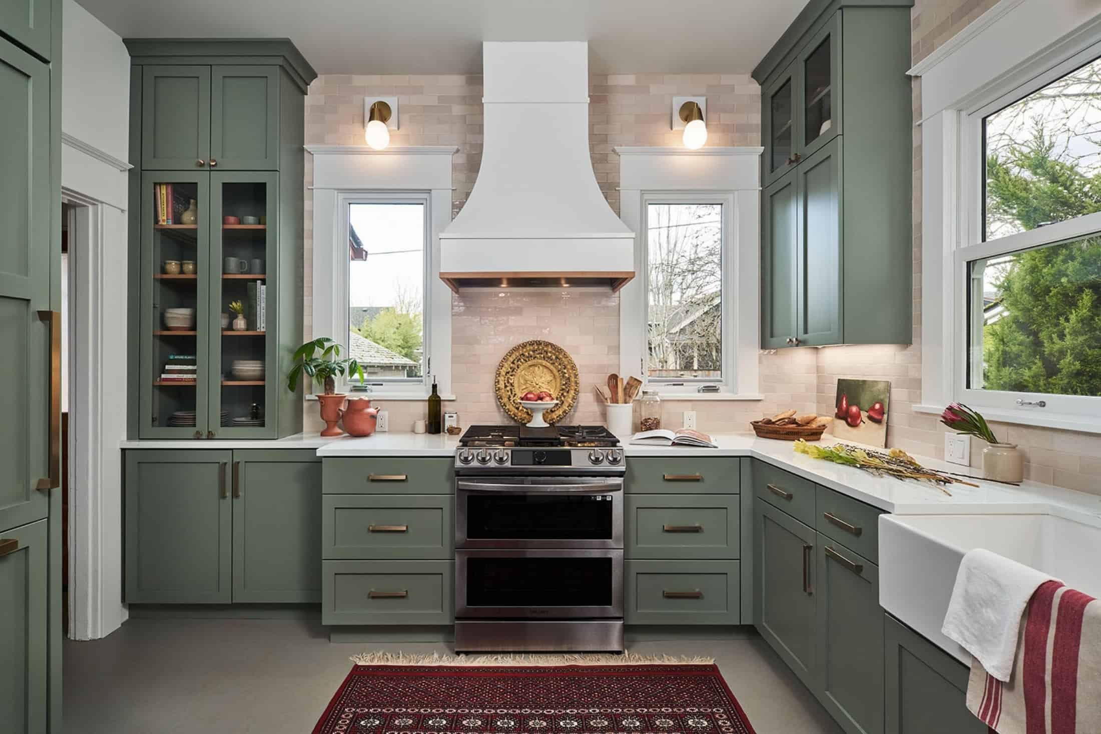 green transitional kitchen renovation