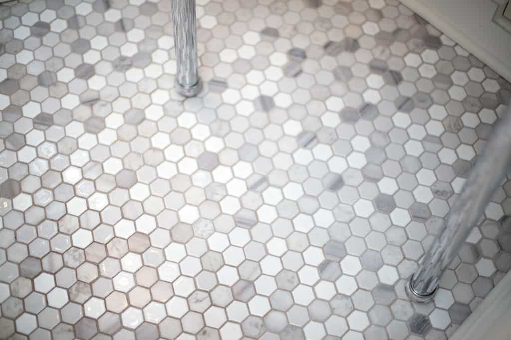 Powder room: Hexagonal tile floor.