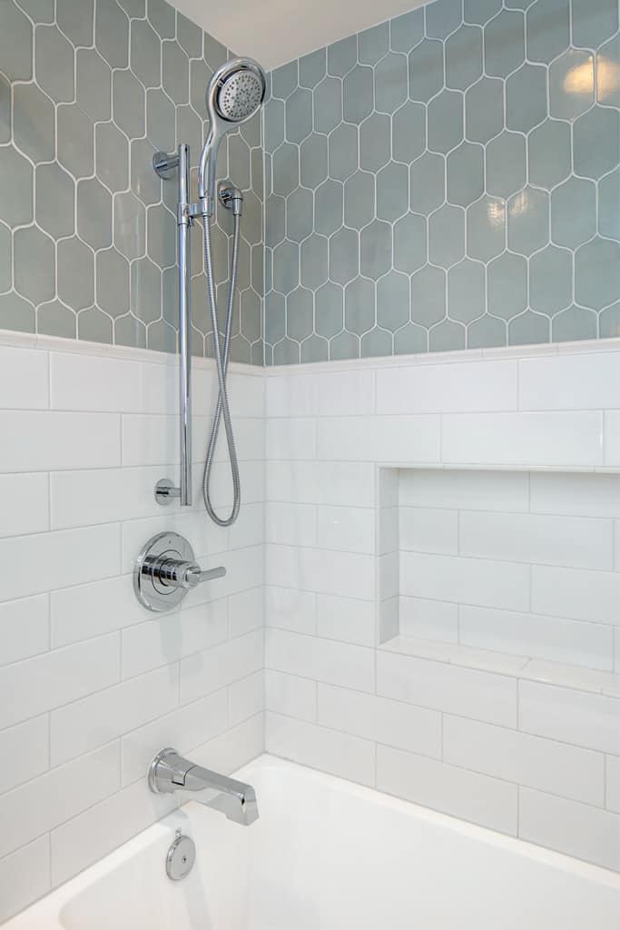 Guest / Kids bath: Tub shower combo with custom tile.