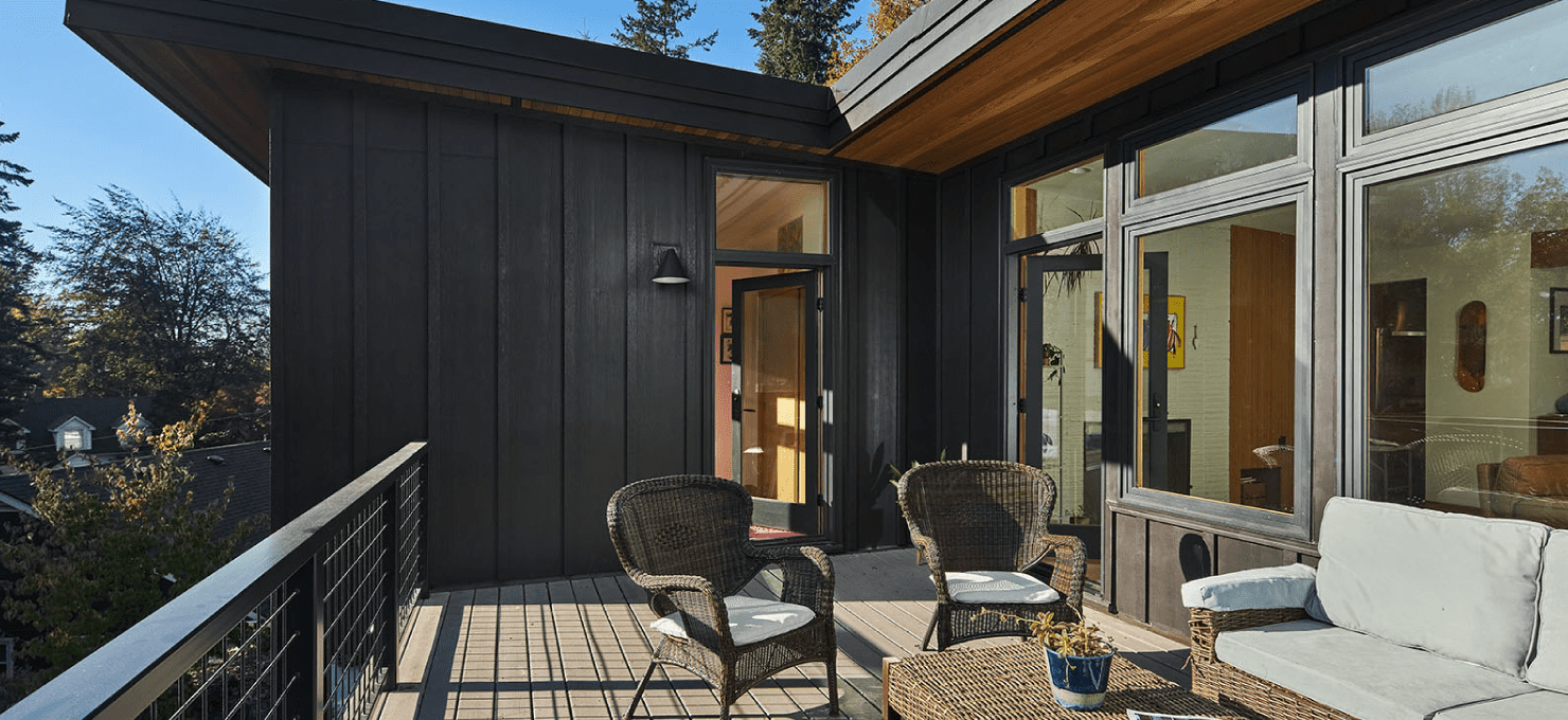 patio desk in summer with chairs and view.