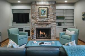 living room with fireplace and cozy seating.