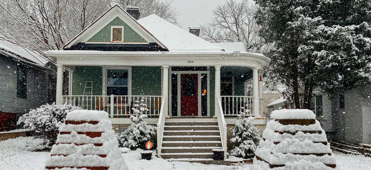 portland home covered in snow on a winter day.