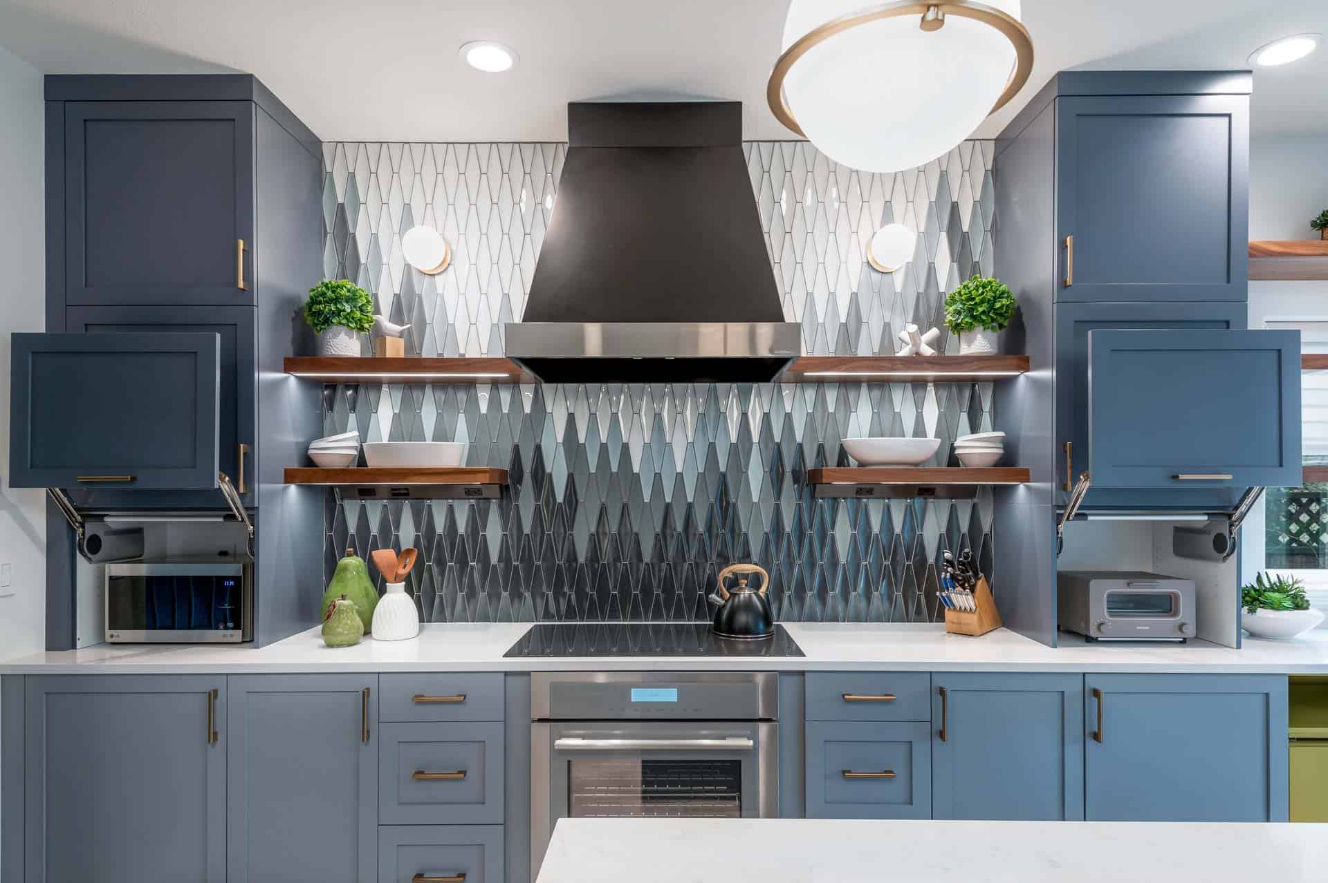 Custom cabinetry conceals small appliances in a kitchen designed for entertaining