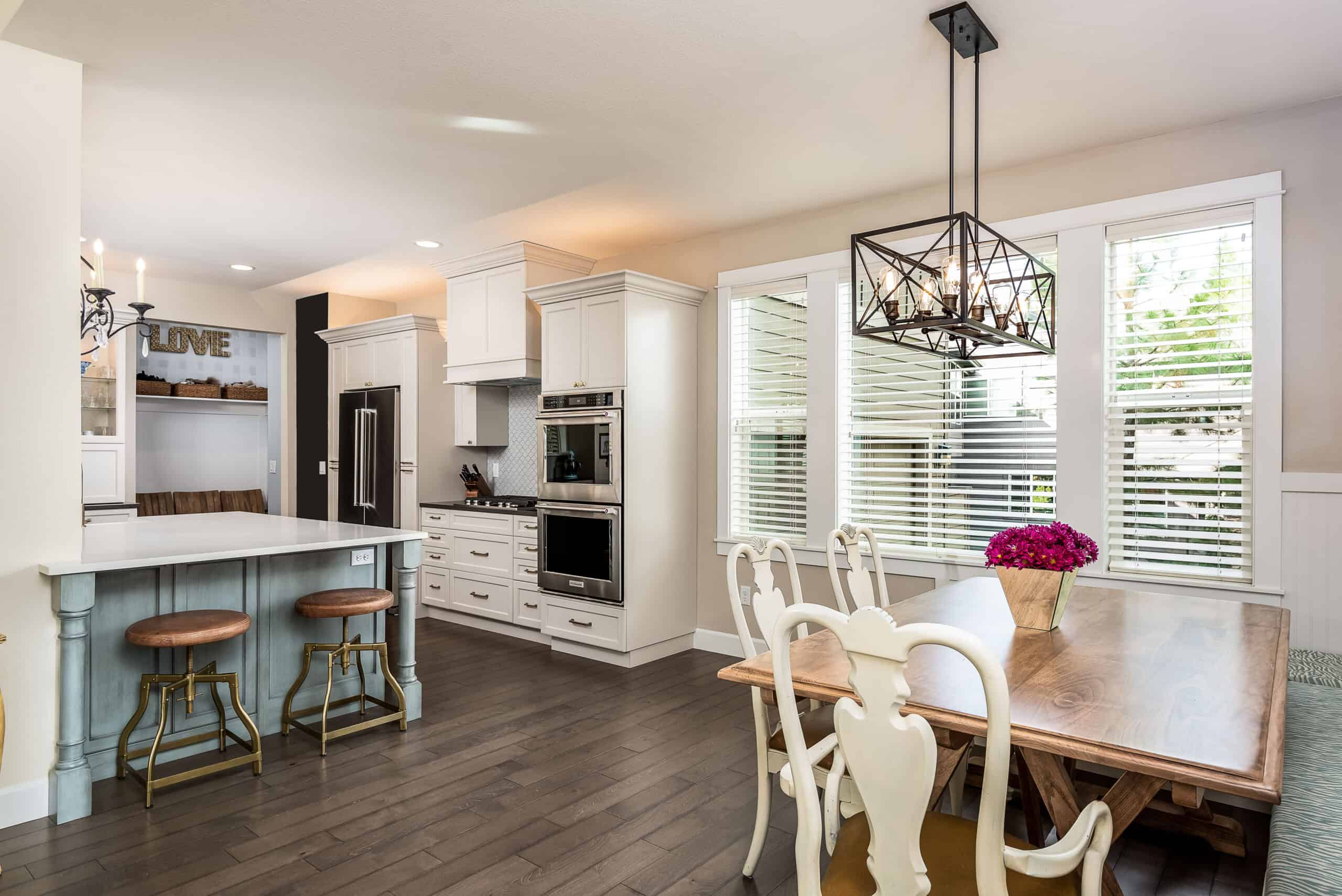 A kitchen designed for entertaining with island and banquette seating