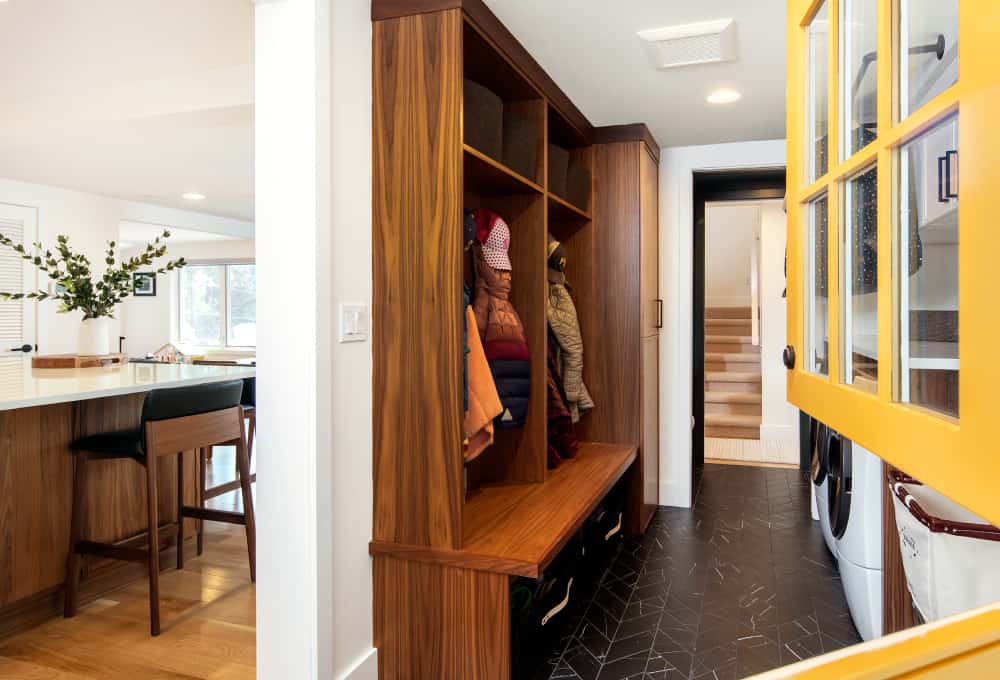 Laundry room with designated wooden storage lockers.