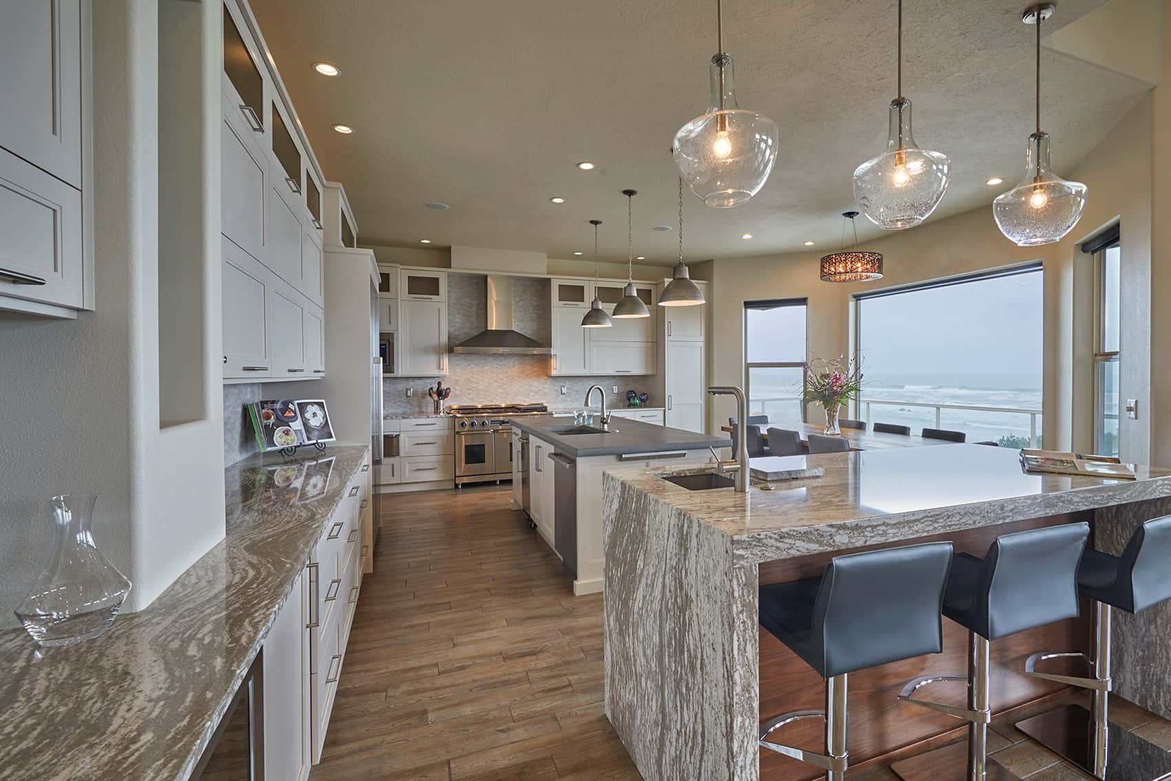 two kitchen islands trend on display in this oregon coast home