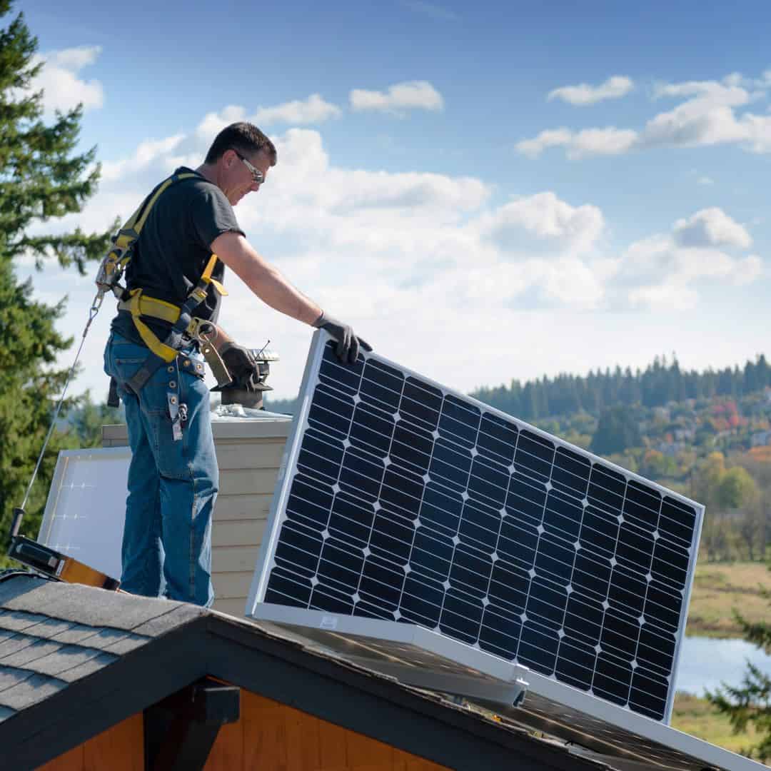 installing solar panels on a roof