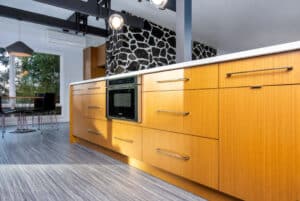 Grey linoleum sheet flooring in a kitchen.