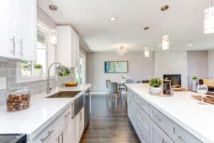 Grey linoleum sheet flooring in a kitchen.