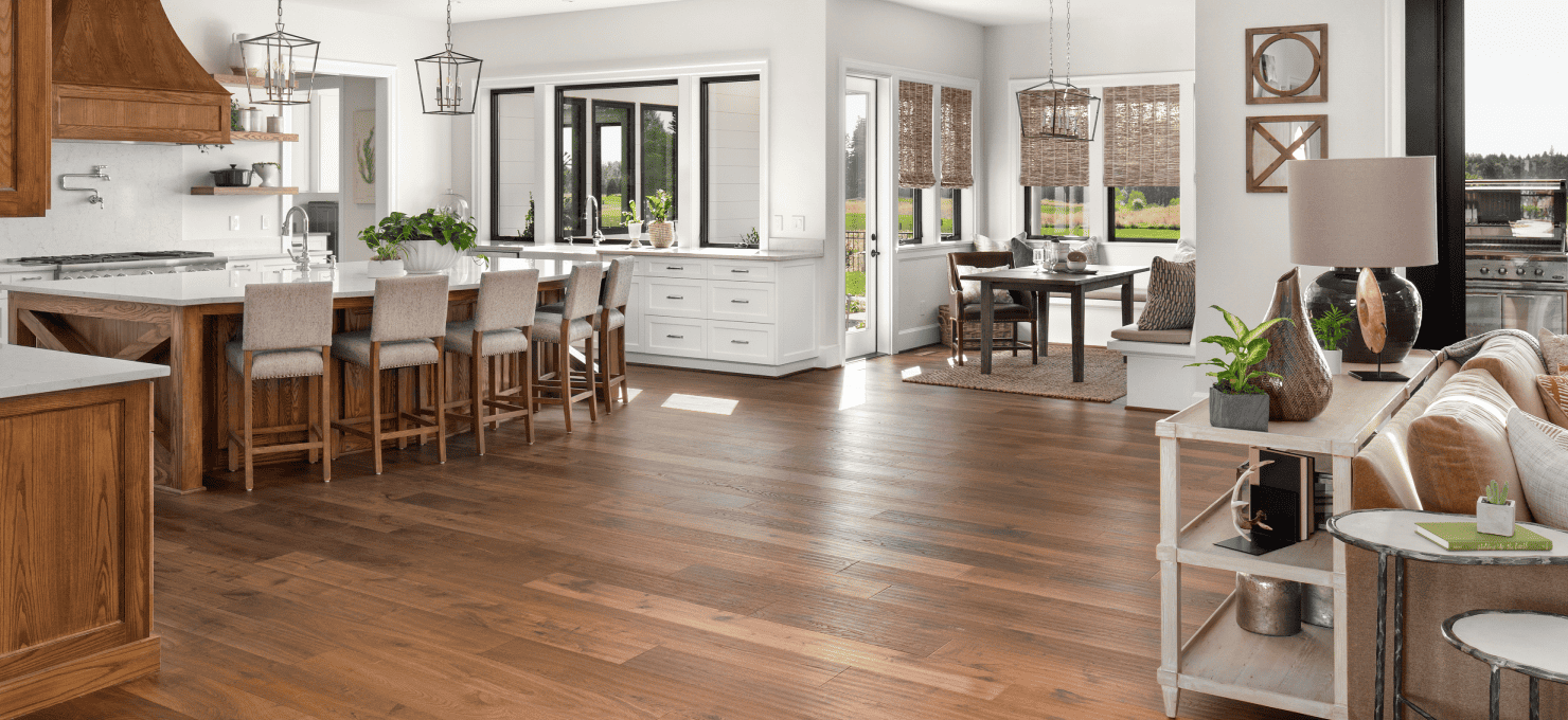 Kitchen and dining area with oak hardwood flooring.