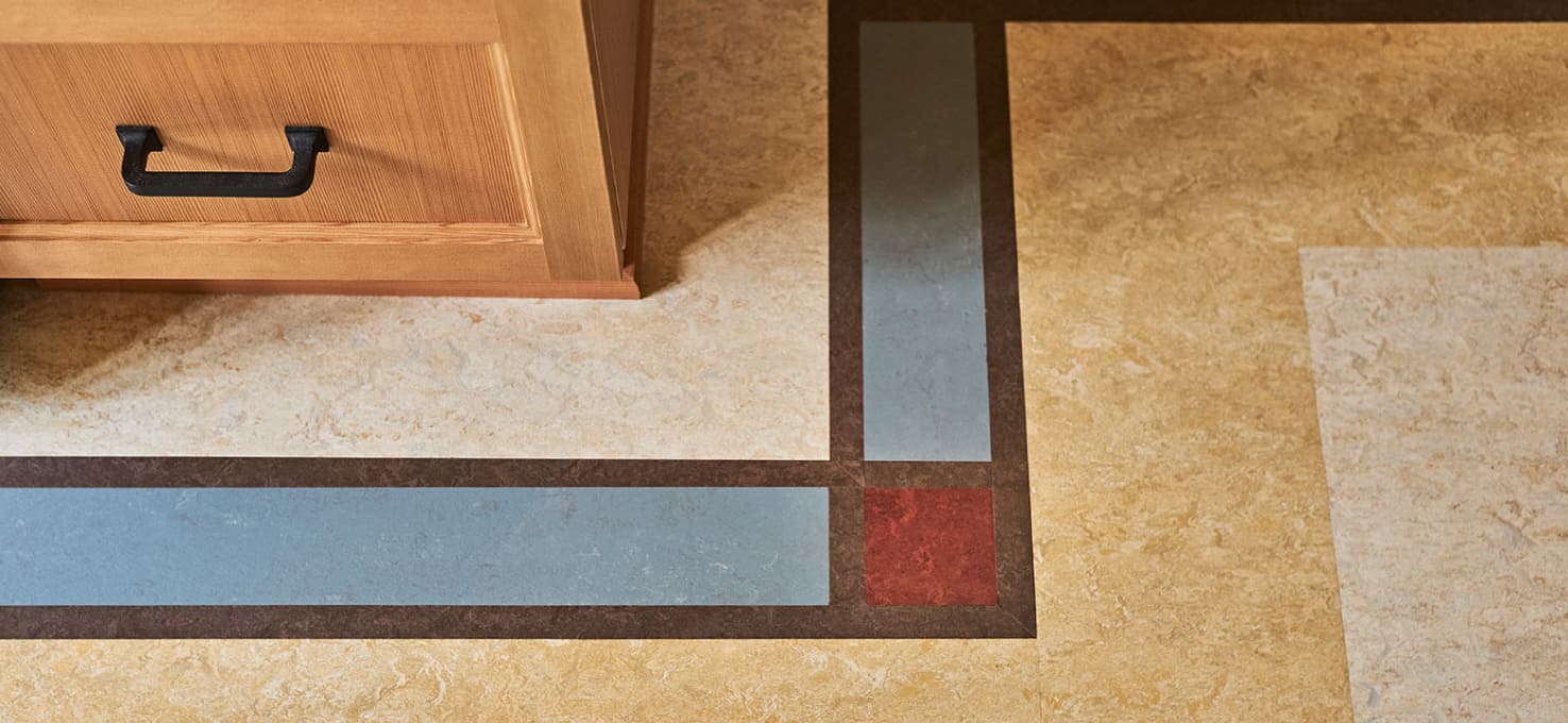 Close up of linoleum flooring in a bathroom.