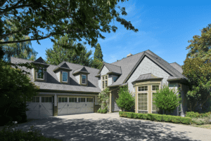 Two story home with a two door garage.