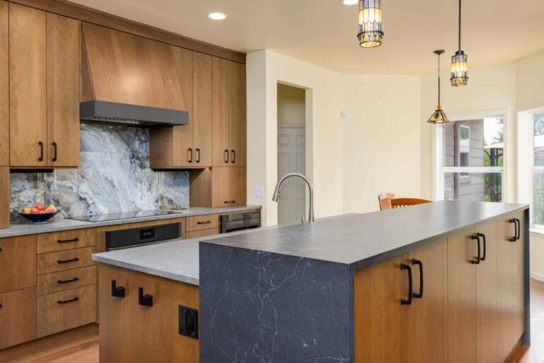 Craftsman-inspired kitchen with a double waterfall raised island counter.