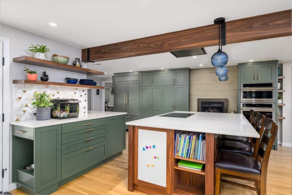 A remodeled kitchen with an activity space for small children