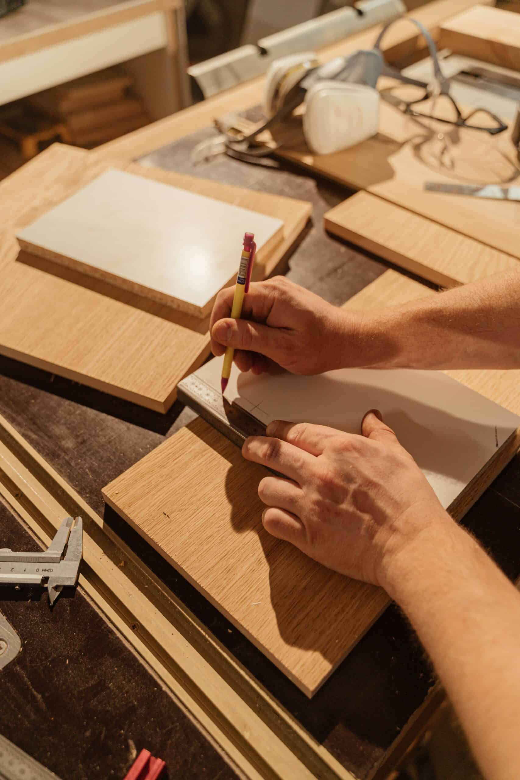 an artisan creating custom cabinets