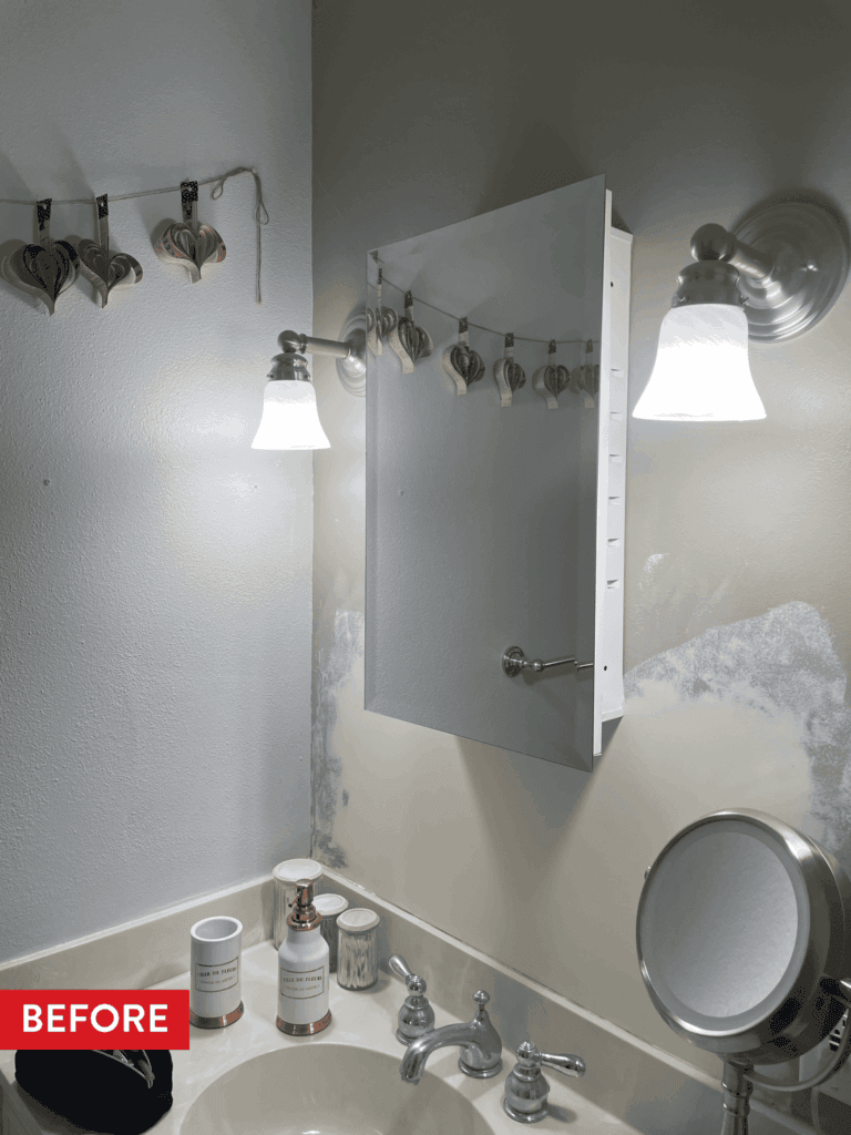 An outdated and partially repaired bathroom before remodeling