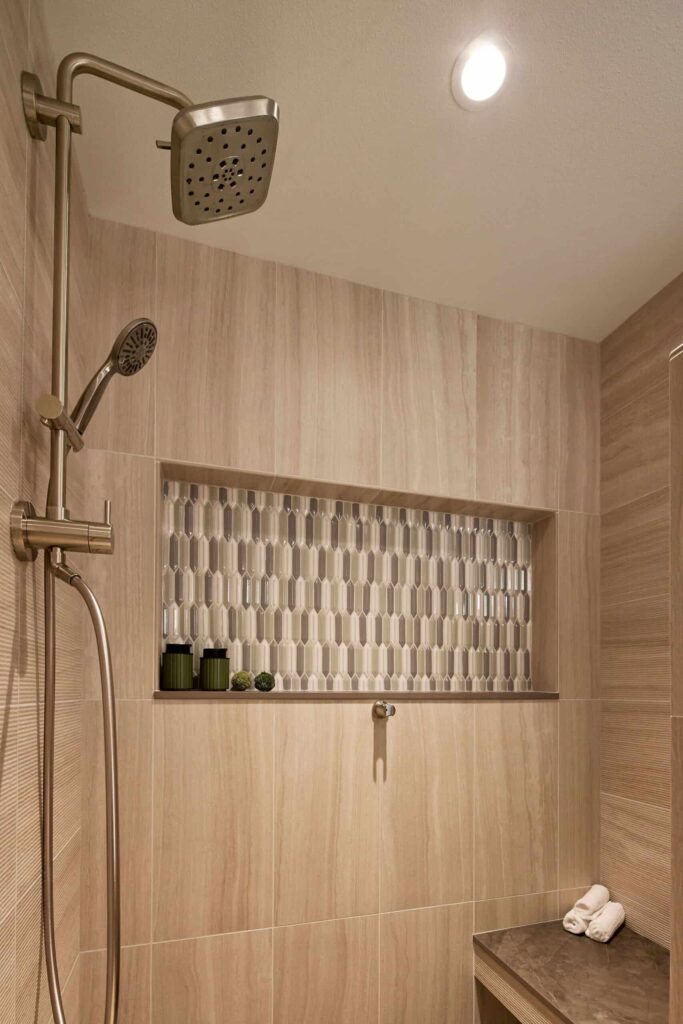 A remodeled mid-century inspired primary bathroom shower