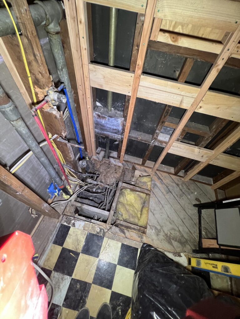 Knob and tube electrical wiring discovered during deconstruction of a bathroom remodel