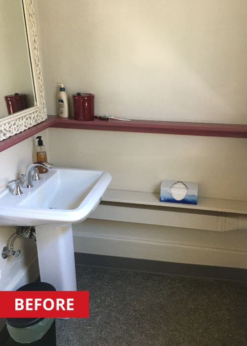 White ceramic sink inside of a garage restroom