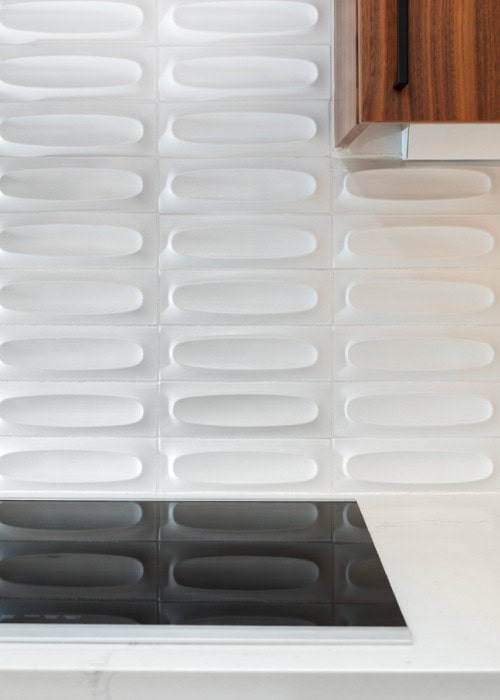 Heath Ceramics tile white dimensional backsplash.