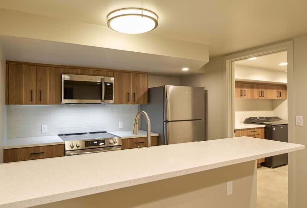 Long white kitchen island.