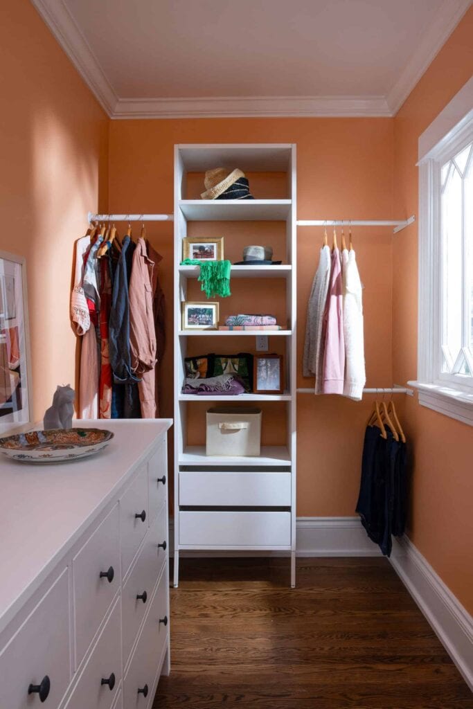 The closet of the remodeled primary bedroom