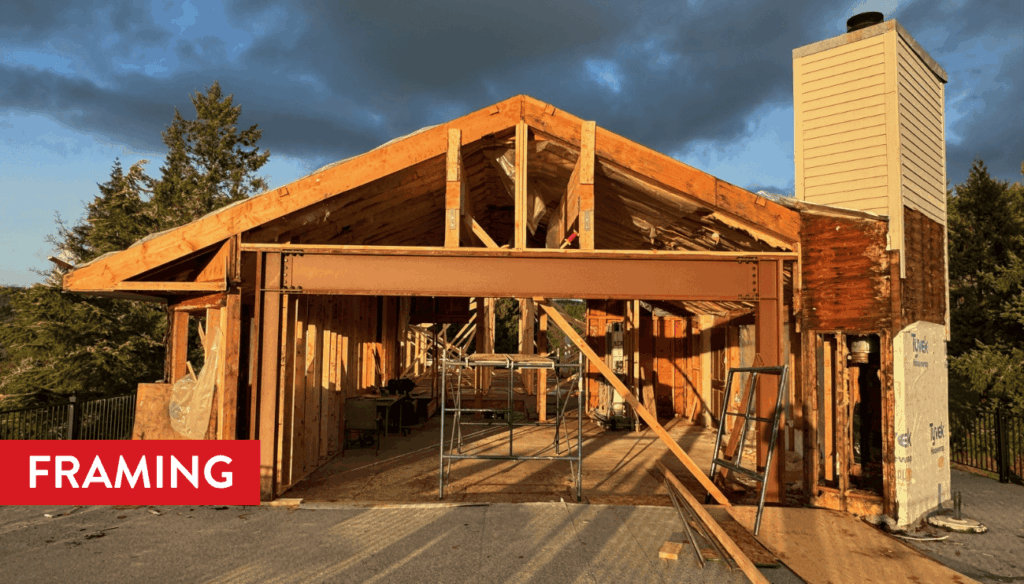 A large steel beam is installed for the oversized sliding glass door opening