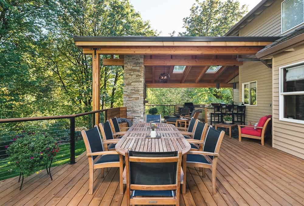Ample outdoor dining space featuring eight-person table
