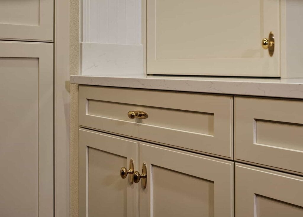 New England inspired kitchen remodel featuring abundant storage.