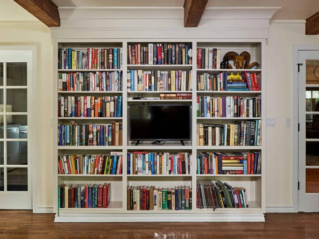Bookcase incorporated into the Living Room adjacent to the kitchen.