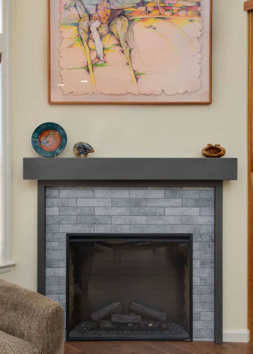 Fireplace with grey brick hearth.