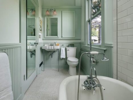 1900s Victorian Inspired Bathroom Portland Historic victorian inspired bathroom remodel with vinyl flooring, clawfoot tub, subway tile backsplash, & built-in cabinets.