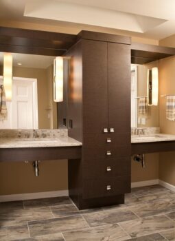 Bellevue Master Bath Seattle 010 Accessible design bathroom sinks with roll-up space, quartz countertops, and large central storage cabinets.