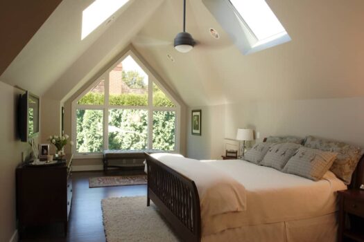 Birdshill Attic Remodel Portland 003 Contemporary style attic remodel bedroom with vaulted ceilings and skylights.