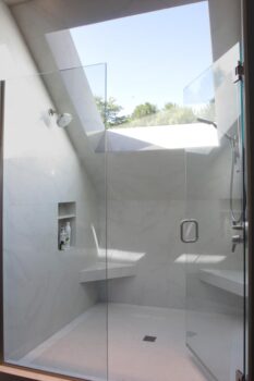 Birdshill Attic Remodel Portland 006 Attic remodel bathroom shower with skylight, frameless shower door, niche shelfs, angled benches and handshower showerhead.