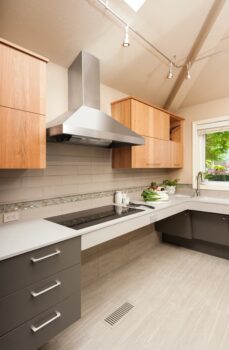 Canby ADA Kitchen Portland 002 Modern accessible design kitchen with wheelchair accessible roll up cooktop, induction cooktop and quartz countertops